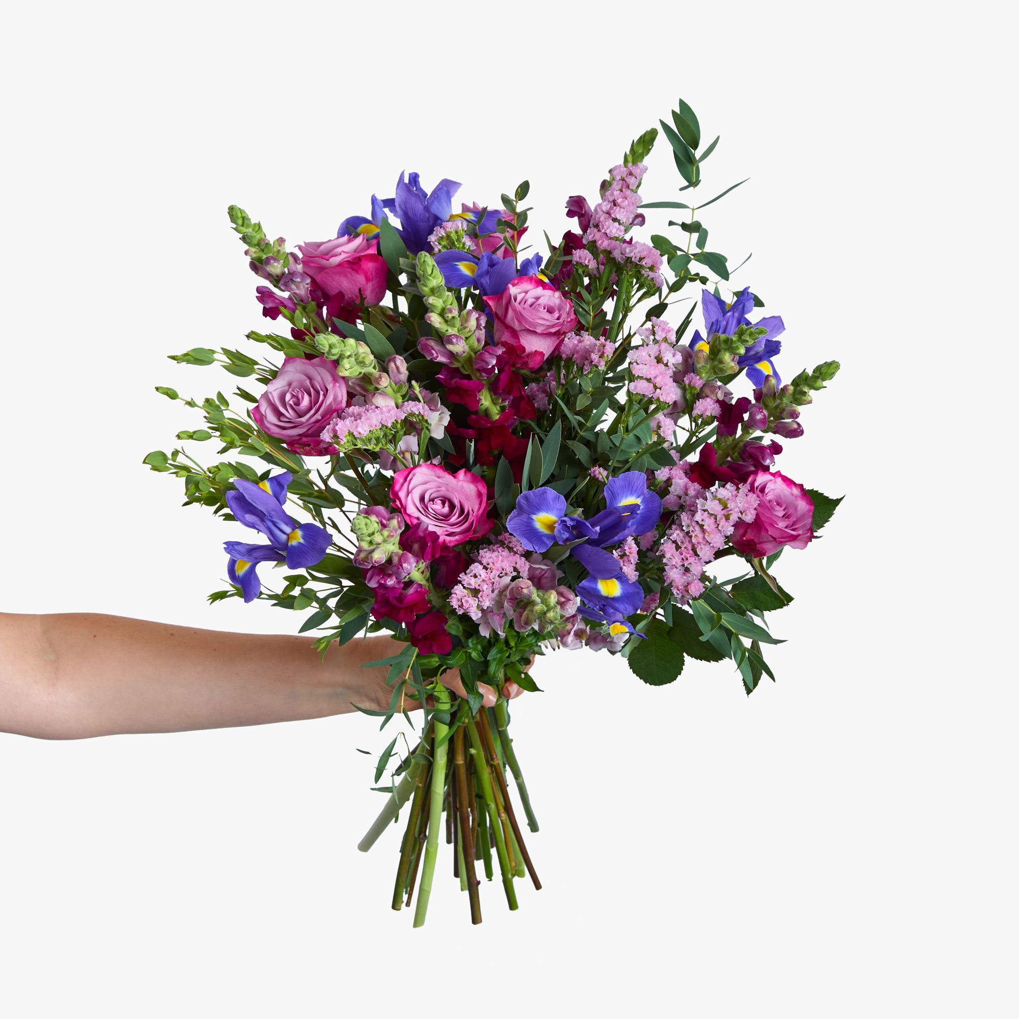 'Deep Purple' roses, irises, pink statice, red antirrhinums, lavender antirrhinums and eucalyptus parvifolia