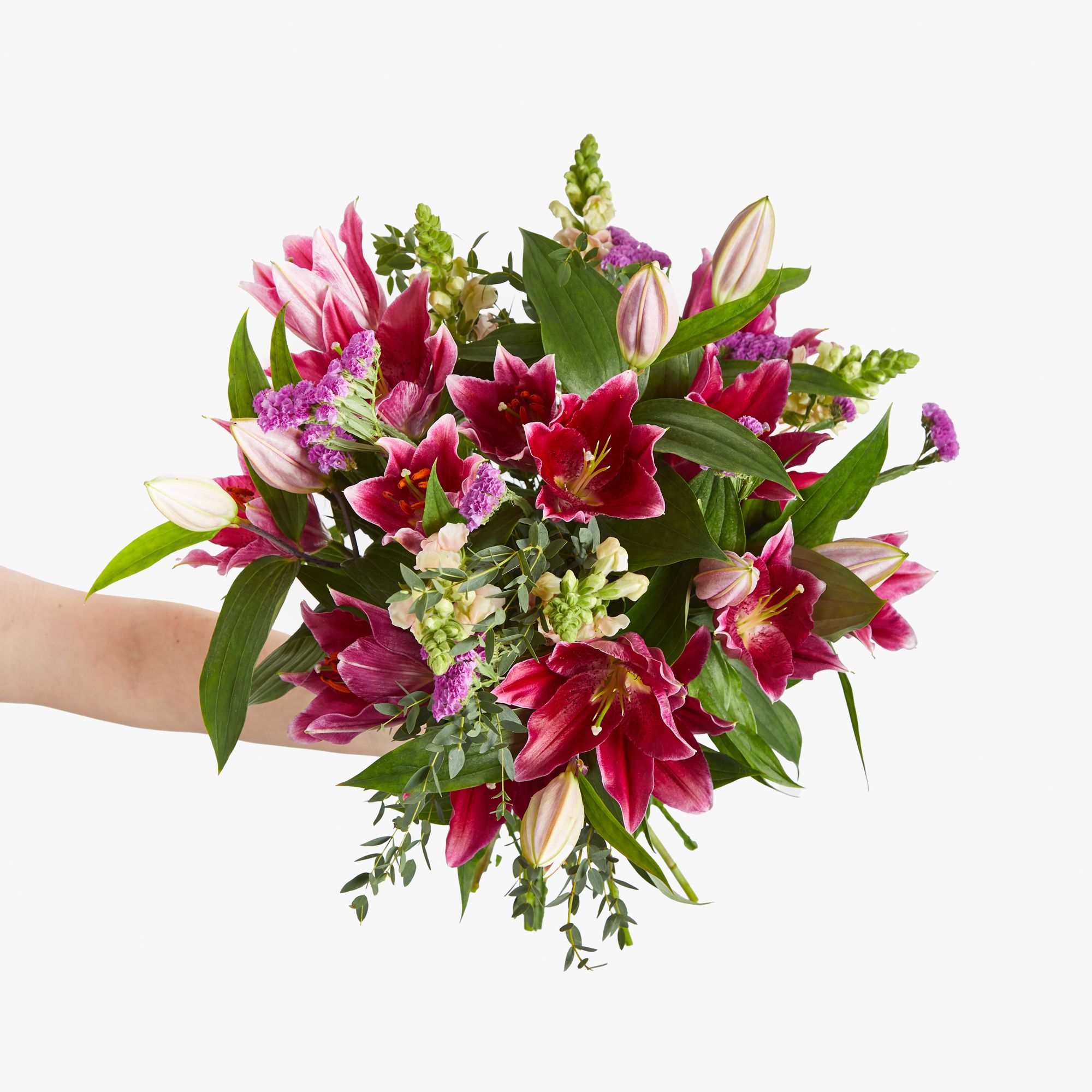 Red 'Pico' lilies, pink statice, pink antirrhinums, eucalyptus parvifolia