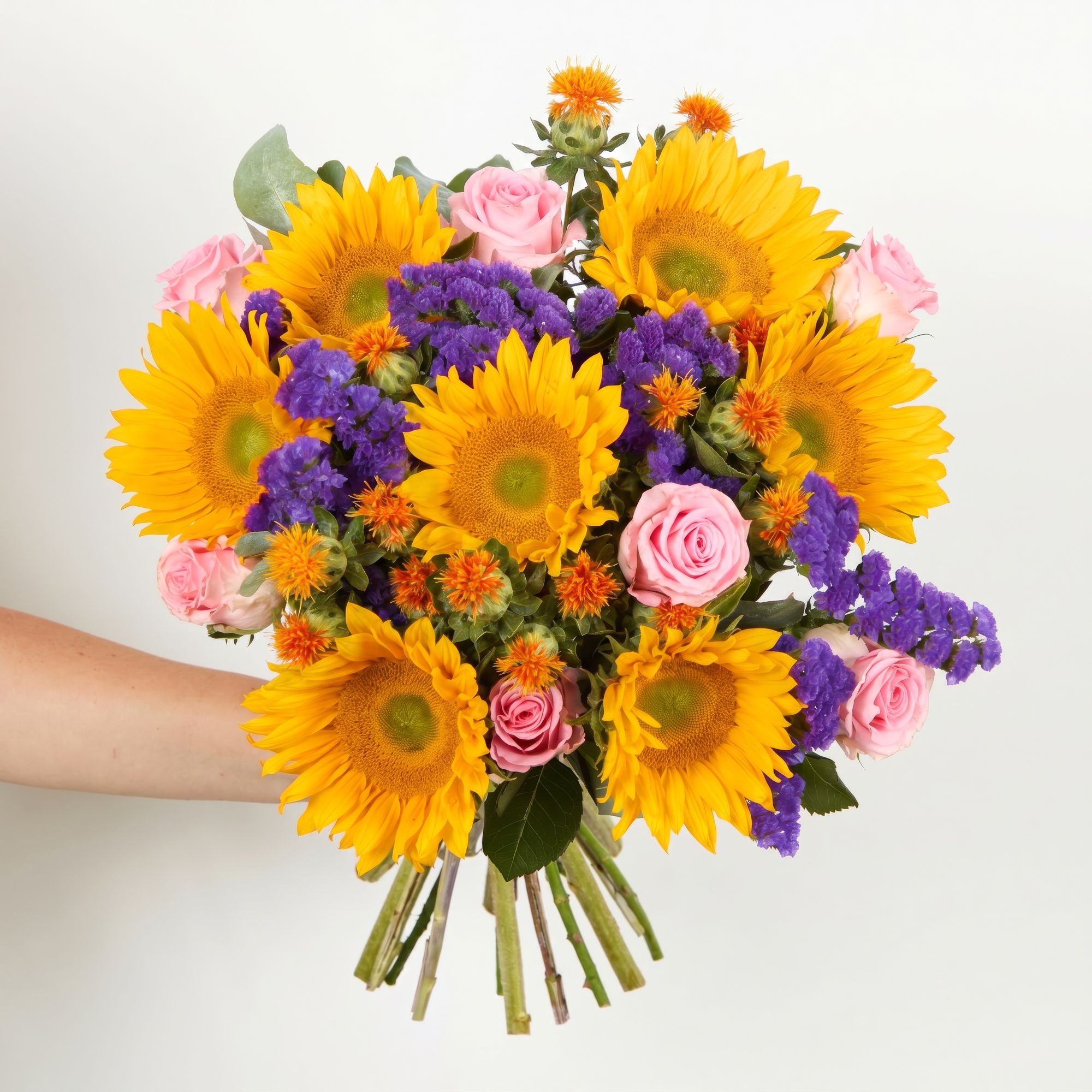 UK-grown green-eye sunflowers, UK-grown carthamus, blue statice, pink roses and eucalyptus robusta
