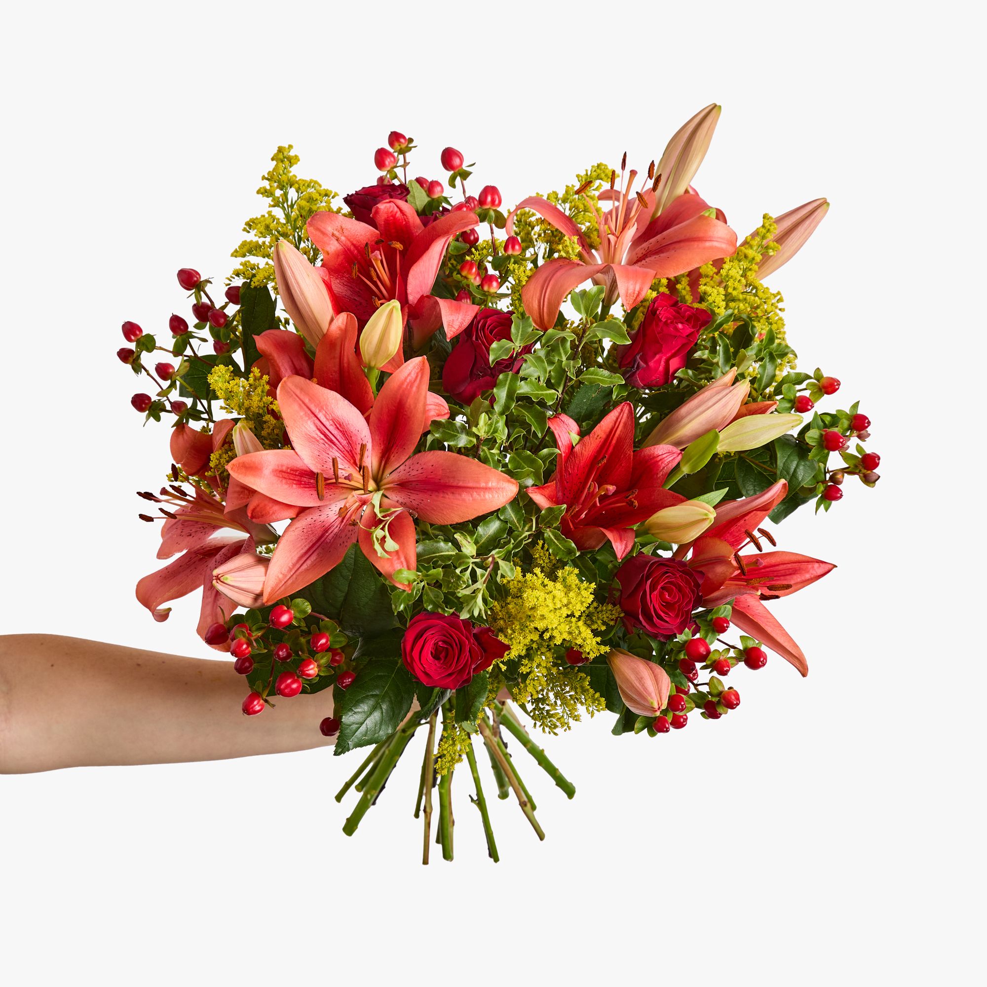 Red ‘LA’ lilies, red roses, red hypericum, solidago and mini pittosporum