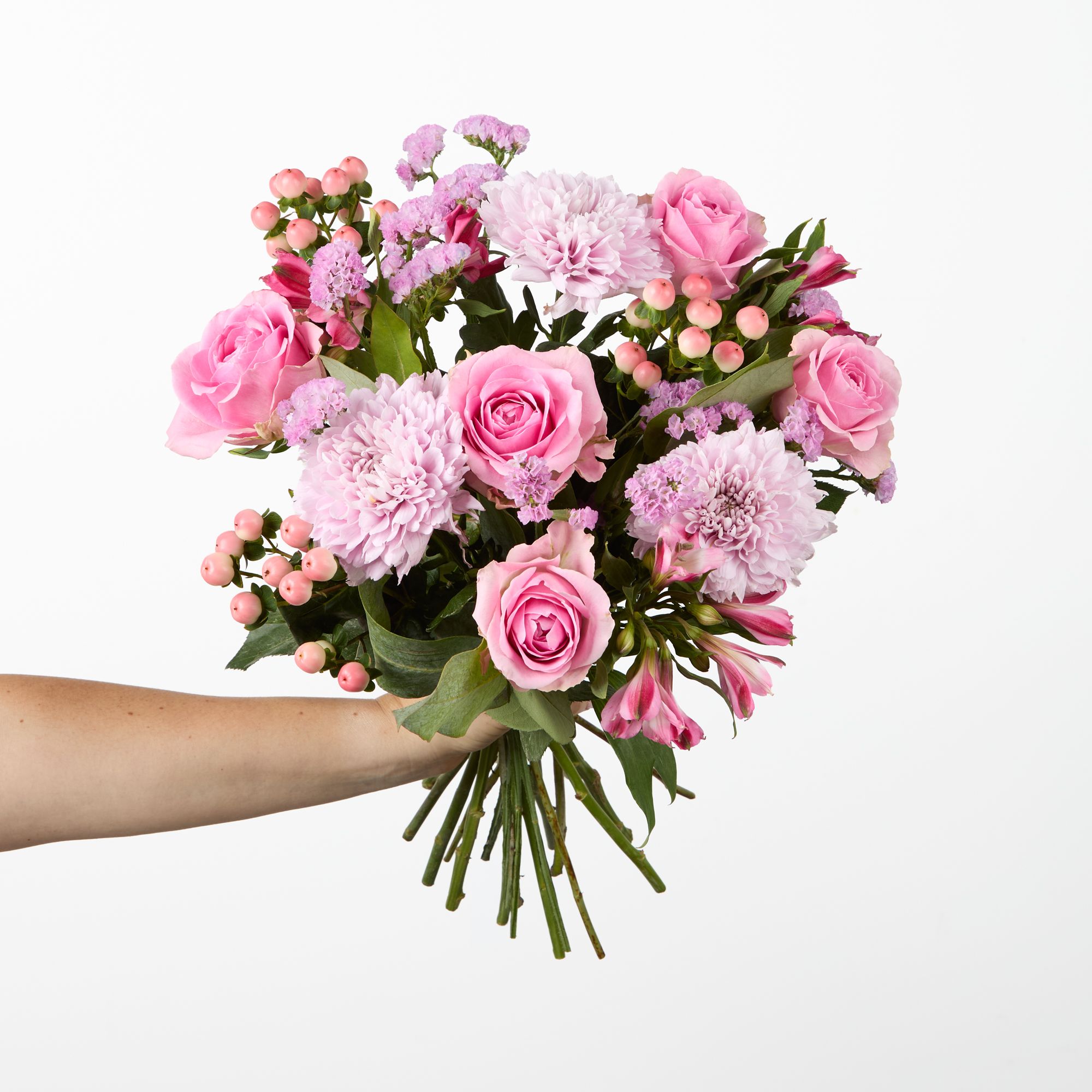 Pink 'Kalimba' chrysanthemums, pink roses, pink alstroemeria, pink statice, 'Casino Coco' hypericum, eucalyptus robusta
